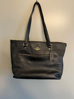 Coach Black Leather Tote. Along with matching card wallet and zip wallet